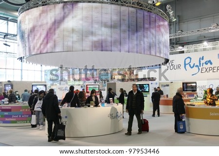 MILAN, ITALY - FEBRUARY 16: People visit Puglia tourism stand at Italy exhibition area during BIT, International Tourism Exchange Exhibition on February 16, 2012 in Milan, Italy.