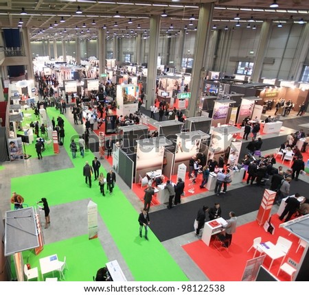 MILAN, ITALY - OCT. 19: Panoramic view of people visiting technologies area during SMAU, international fair of business intelligence and information technology October 19, 2011 in Milan, Italy.