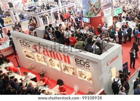 MILAN, ITALY - MARCH 26: Panoramic view of people visiting Canon exhibition areas at Photoshow, International Photo and Digital Imagin Exhibition on March 26, 2011 in Milan, Italy.