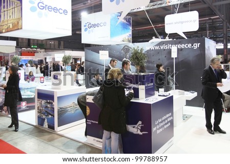 MILAN, ITALY - FEBRUARY 16: People visit Greece international tourism stand at Italy exhibition area during BIT, International Tourism Exchange Exhibition on February 16, 2012 in Milan, Italy.