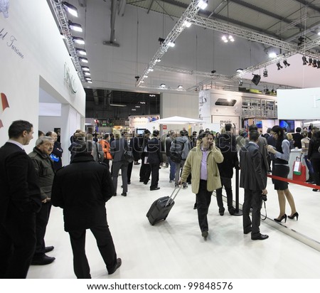 MILAN, ITALY - FEBRUARY 17: People visit Italy national tourism exhibition area at BIT, International Tourism Exchange Exhibition on February 17, 2011 in Milan, Italy.