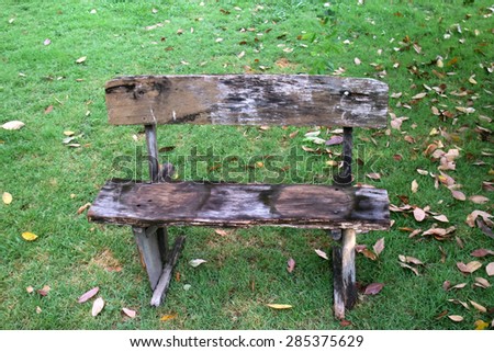 Old wood chair on the grass