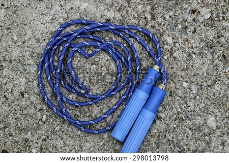 skipping rope for an exercise on cement floor