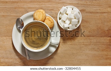 Shots Espresso on Rustic Shot Of Filter Coffee And Biscuits On Table Stock Photo