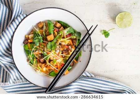 Thai stir fry with tofu, coriander and snow pea