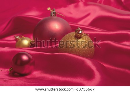 Pretty Christmas baubles with seasonal background