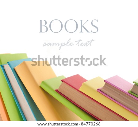 Many colorful books in a row creating a border frame. Isolated on white.