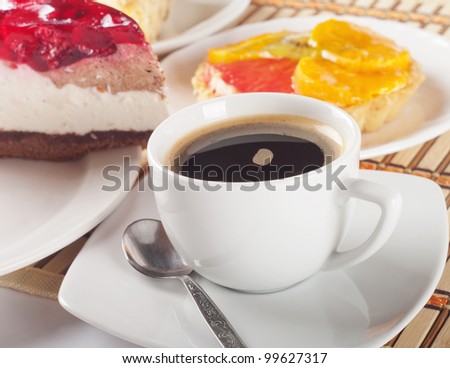 cup of coffee and fruit cake