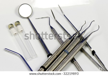 Tools of the trade for the dentist on a tray.