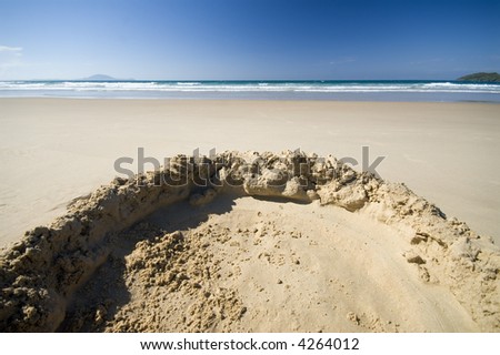Remains of children\'s sandcastle.