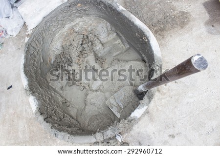 Mix concrete manually in a construction site