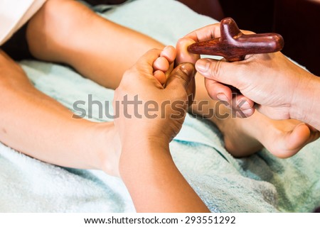 Foot massage, Foot reflexology.Natural medicine, reflexology, acupressure foot massage oppresses energy flow points ,Foot pressure points in the body: Sinuses
