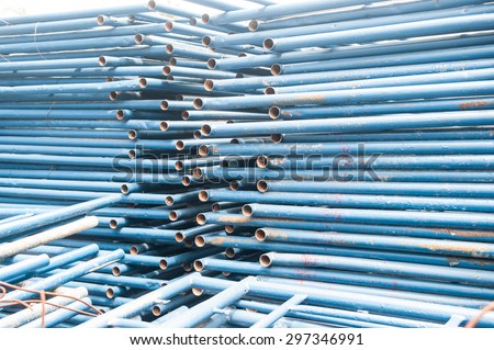 Blue steel scaffolding ,a temporary structure used to support a work crew and materials to aid in the construction, maintenance and repair of buildings,