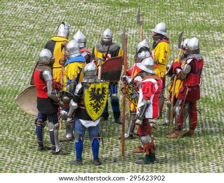 MIR - JUL 9: Group of knights meeting on the grass before the battle during festival on Jun 6, 2011 in Mir Castle, Belarus.