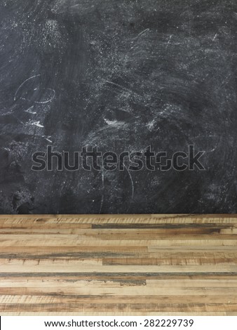 Blackboard wall and wooden floor background