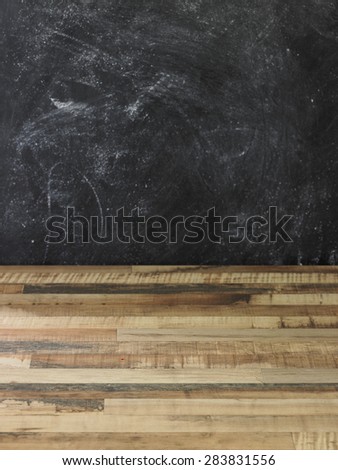 Blackboard wall and wooden floor background