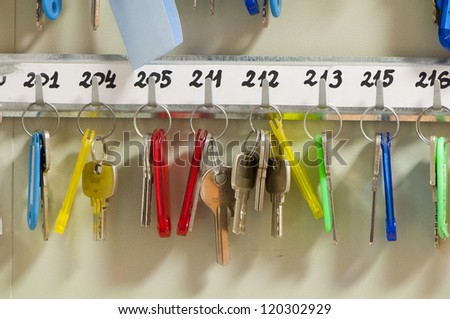many keys hanging on hooks