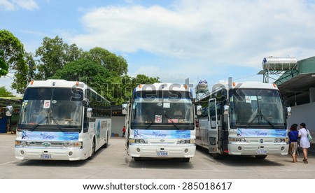 HO CHI MINH CITY, VIETNAM - MAY 14, 2015. Group of colorful buses wait to new trip at Mien Dong bus station. This depot has many public passengers at Saigon, Vietnam.