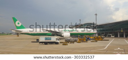 HO CHI MINH, VIETNAM - JUL 2, 2015. Civil aircrafts (EVA Air) parking at Tan Son Nhat International airport in Saigon (Ho Chi Minh city), Vietnam. It is the international airport in southern Vietnam.