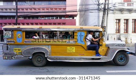 MANILA, PHILIPPINES - FEBRUARY 26, 2015. Jeepney on the street in Manila, Philippines. Jeepney is a most popular public transport on Philippines.