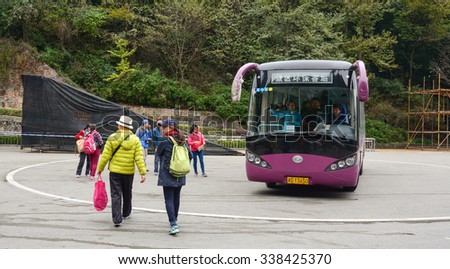 CHANGSHA, CHINA - NOV 4, 2015. A public bus on the station in Changsha, China. Start price is CNY 1 for common buses and CNY 1.5 for air-conditioned buses. Running hour buses is 5:30 to 21:00.
