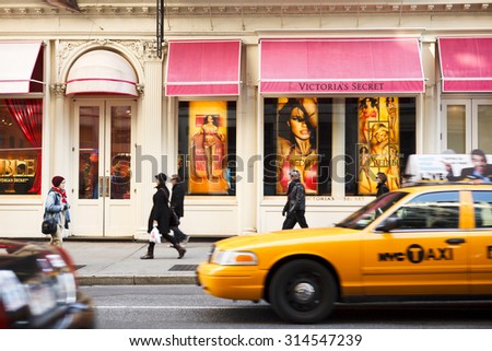 New York, New York, USA - March 27, 2011: The Victoria\'s Secret store on Broadway in the Soho area of downtown Manhattan. People are seen as a car and Taxi drive by in the late afternoon.