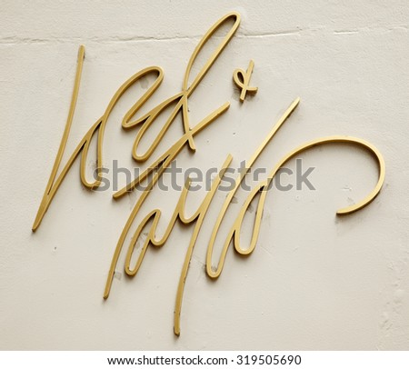 New York, New York, USA - March 14, 2011: Closeup of one of the metal Lord and Taylor logos found on Lord and Taylor flagship department store on Fifth avenue in Manhattan.