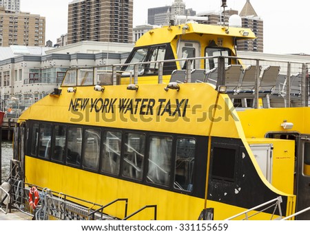New York, New York, USA - June 17, 2015: A docked New York Water Taxi boat. This water taxi takes people between lower Manhattan and Brooklyn in addition to other routes.