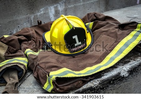 Firefighter uniform with yellow and black helmet