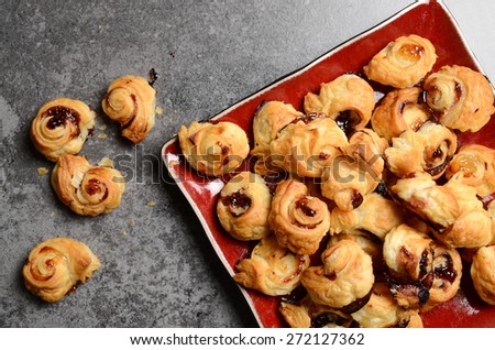 Puff pastry rolls with sweet fruity marmalade