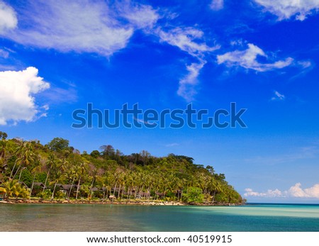 Tropical island nature, palms tree, rock, mountain, beach, sea water, house of family hotel