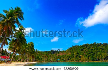 Summer beach, family hotel, sea water, remote island, sky background