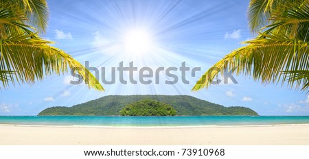 Palm tree leaves gateway to white sand beach and green island in the sea. Dream vacations view.