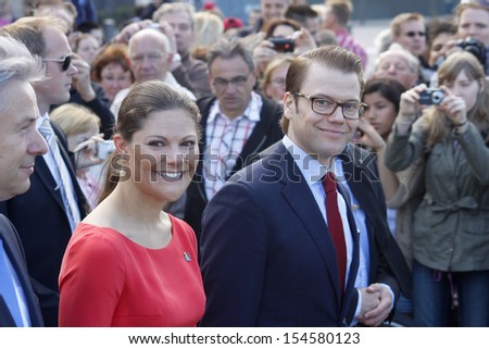 BERLIN-MAY 27, 2011 : Klaus Wowereit, Crown Princess Victoria of Sweden with Prince Daniel of Sweden during an official visit at the Pariser Platz in Berlin.