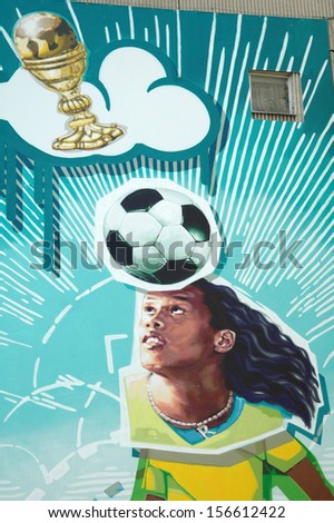 JUNE 15, 2006 - BERLIN: Ronaldinho as a soccer god - a painting of the current Brazilian soccer stars on a Wall in Berlin.