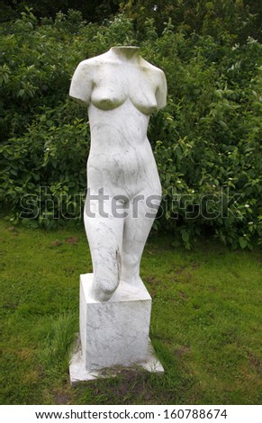 AUGUST 2011 - SCHLESWIG: a female torso sculpture in the sculpture garden of Gottorf Castle (Schloss Gottorf), Schleswig, Germany.