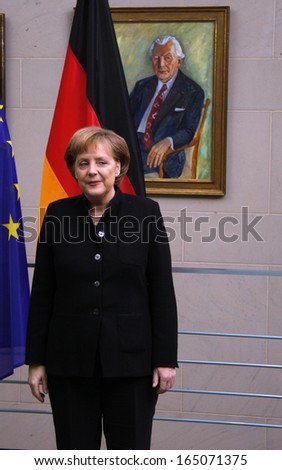 FEBRUARY 18, 2008 - BERLIN: German Chancellor Angela Merkel (in the background a painting portrait of her predecessor, Kurt Georg Kiesinger) during a reception in the Chanclery in Berlin.