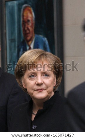 FEBRUARY 18, 2008 - BERLIN: German Chancellor Angela Merkel (in the background a painting portrait of her predecessor, Helmut Kohl) during a reception in the Chanclery in Berlin.