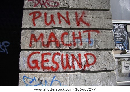 CIRCA MARCH 2014 - BERLIN: a graffity slogan on a wall \