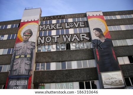 CIRCA MARCH 2014 - BERLIN: murial on a house fassade with the slogan \
