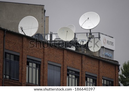 CIRCA SEPTEMBER 2013 - BERLIN: satellite dishes on top of the building of the news agency Reuters in Berlin.