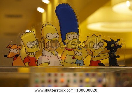 CIRCA MARCH 2014 - BERLIN: the characters of the Simpson comic tv series: Homer, Maggie, Lisa, Marge and Bart Simpson.