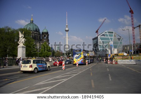 CIRCA APRIL 2014 - BERLIN: street scene: traffic on the Schlossbruecke, Berliner Dom, Fernsehturm, Humboldt Box, Berlin-Mitte.