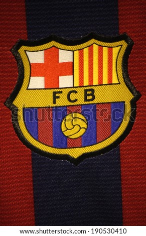 CIRCA MARCH 2014 BERLIN the logo of the soccer club FC Barcelona on an official jersey of the club Berlin CIRCA MARCH 2014 BERLIN the logo of the soccer club FC Barcelona on an official jersey of the club Berlin