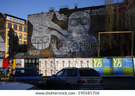 CIRCA MARCH 2013 - BERLIN: street art in Berlin: a big murial on a building in the Kreuzberg district of Berlin.
