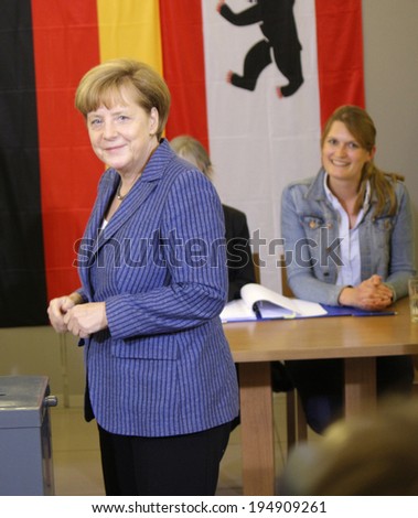 MAY 25, 2014 - BERLIN: German Chancellor Angela Merkel at the ballot box on election day, elections to the European Parliament in Germany, Berlin.