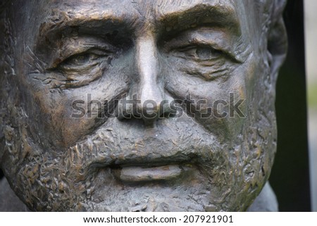 CIRCA JULY 2014 - SCHRUNS: a portrait bust of the US American writer and Nobel Prize Winner, Ernest Hemingway, Schruns, Montafon, Austria.