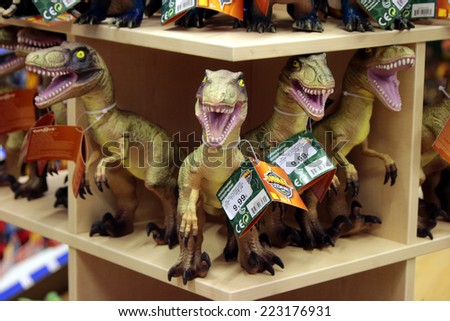 CIRCA SEPTEMBER 2014 - BERLIN: dinosaur fugurines in a toy store - the new shopping mall at the Leipziger Platz 