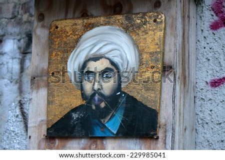 CIRCA SEPTEMBER 2014 - BERLIN: a portrait painting of an unidentified Islamic politician or religious leader, Berlin.