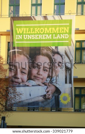 NOVEMBER 2015 - BERLIN: a large scale poster at the headquarters of the Green Party promoting liberal migration policies with the  slogan \